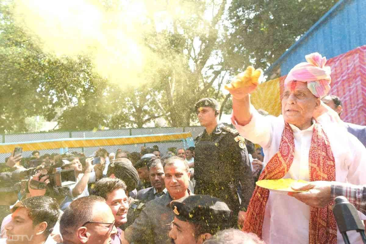 Union Minister Rajnath Singh celebrated Holi with party workers at his residence. In one of the videos, he is seen celebrating playing drums.