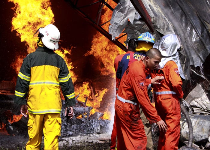The aircraft, owned by Victoria Air Inc., departed for Puerto Princesa city in Palawan province southwest of Manila around noon but the pilot turned the plane back minutes later asking for permission for an emergency landing, airport security manager Angel Atutubo said. (AP Photo)