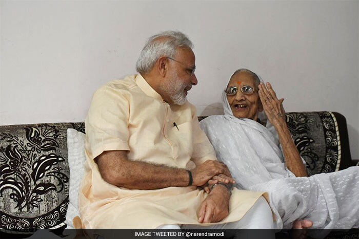 PM Modi began his day with paying a visit to his mother, Heeraben, in Gandhinagar.