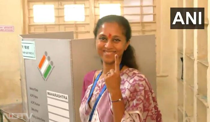 NCP-SCP candidate from Baramati Lok Sabha seat, Supriya Sule casts vote at a polling booth in Baramati.