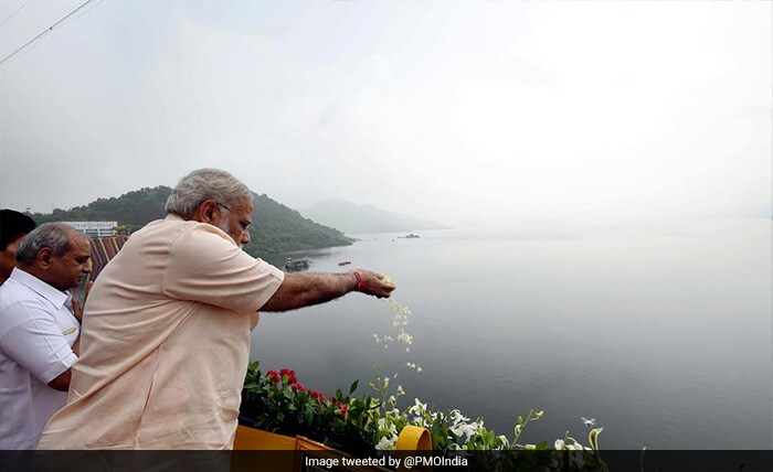 PM Modi offered prayers while inaugurating the dam on Narmada river.