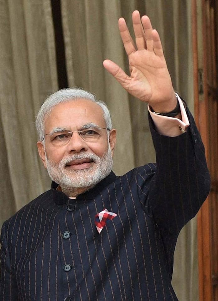 Going One, Two, Three, Sold! : Prime Minister Modi\'s Pinstripe Suit Auctioned Off