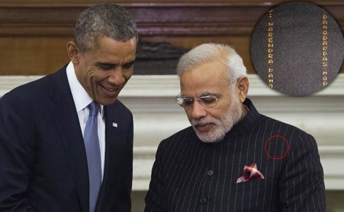 Going One, Two, Three, Sold! : Prime Minister Modi\'s Pinstripe Suit Auctioned Off
