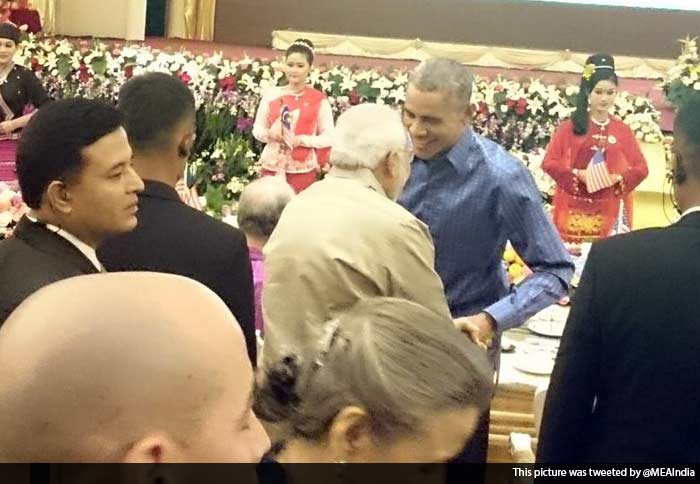 PM Modi meets US President Barack Obama. Obama greeted PM Modi by calling him a 'man of action'.