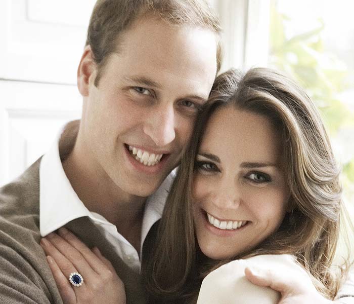 Recetly, Clarence House Press released the official pictures of Prince William and fianc�e Kate Middleton's engagement.<br> <br>

Posing in a stunning white Reiss dress, Kate and William were caught embracing.<br> <br>

The photographs, few formal and the other more casual, portray William and Kate, both 28, holding each other in 16th-century St James' Palace.(AFP Photo)