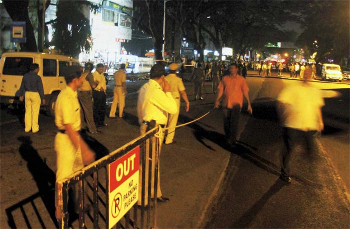 The blasts took place outside the Balgandharva auditorium used to stage plays, at a statue near that theatre, opposite a McDonalds outlet and near a bank.