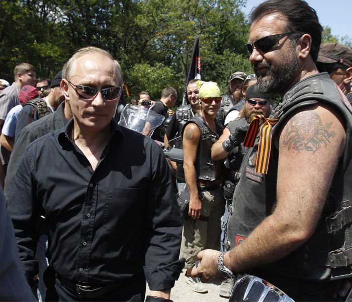 Putin rides Harley Davidson at motorcycle show