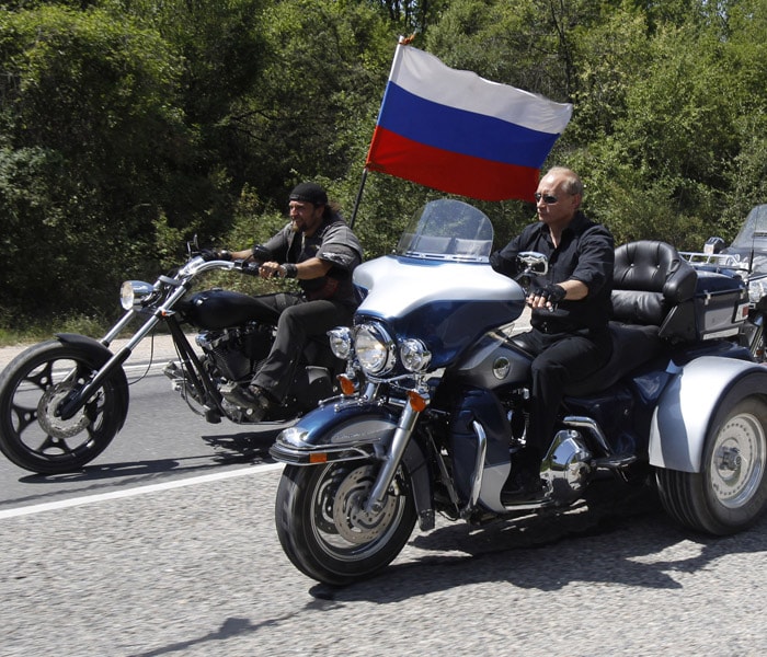Putin rides Harley Davidson at motorcycle show