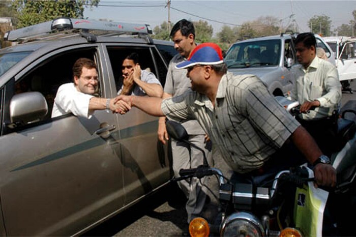 Rahul has won hearts time and again with his 'common man' approach. In August 2009, the AICC General Secretary took the Metro to reach as close as possible to his 10 Janpath home after he returned to Delhi from Raipur after a two-day visit to Chhattisgarh.<br><br> Traffic on all arterial roads in the Capital had gone haywire for several hours following heavy rains and hundreds of vehicles remained stuck for varying durations in the snarls. Rahul landed at the Indira Gandhi International Airport and took a detour to the nearby Metro station at Dwarka. He then boarded the underground train that took him to Rajiv Chowk station, about two kms from his home. (Photo: PTI)