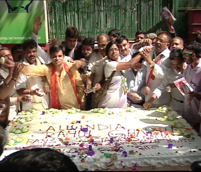 This year, partymen celebrated the Congress general secretary's birthday by cutting a 70 kg cake outside the Congress office. They then distributed it among children.