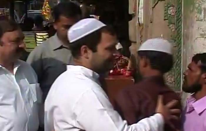 Eid-ul-Azha or Festival of Sacrifice is being celebrated by Muslims across the world. <br /> <br /> Seen here: Rahul Gandhi embracing residents of the area.(NDTV Photo)