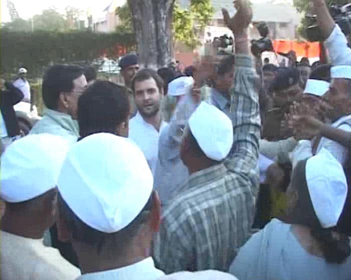 Rahul is surrounded by enthusiastic supporters and people who waited for long to catch a glimpse of their leader.