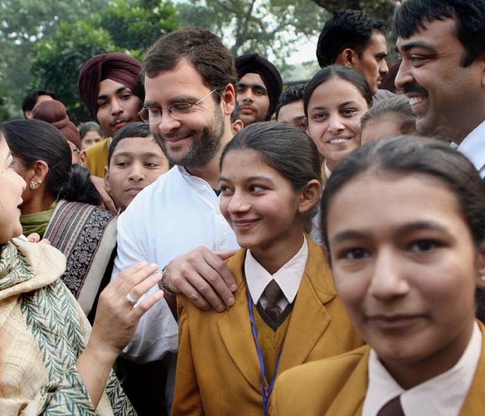 It was an unusual Question Hour at Parliament. School children who were on a field trip to watch Parliament in action ran into Rahul Gandhi. The Congress general secretary was seen mingling with the students, and answering their questions. (PTI)