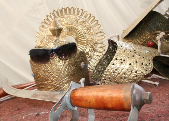 <strong>Modern meets ancient:</strong> Accessories await the Gods and Demons. A pair of sunglasses strike the odd note, but they shall not be going up on stage today. (NDTV Photo)