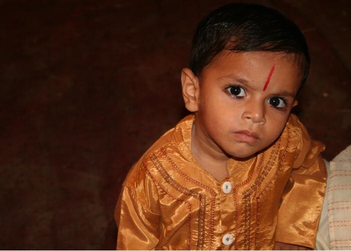 <strong>Future Ram:</strong> An understudy? Or did he lose his way? Clearly a bystander this year, this child is soaking in the electric atmosphere. (NDTV Photo)