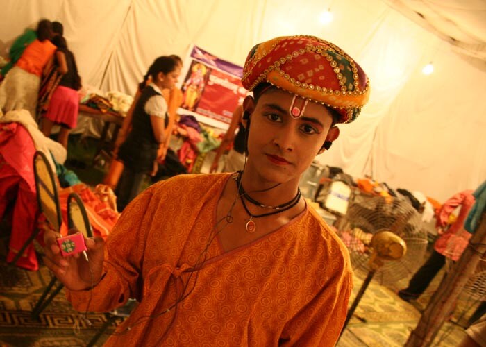 <strong>Music to my ears:</strong>&nbsp; Ready for the Ramlila, he relaxes to music for his ears only. Hip hop anyone? (NDTV Photo)