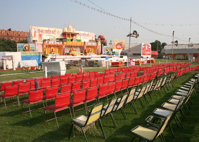 <strong>Musical chairs:</strong> Seating arrangements being readied for a colossal extravaganza. Come night and the red chairs shall seat the gentry. The rest are up for grabs &ndash; first come, first served. (NDTV Photo)