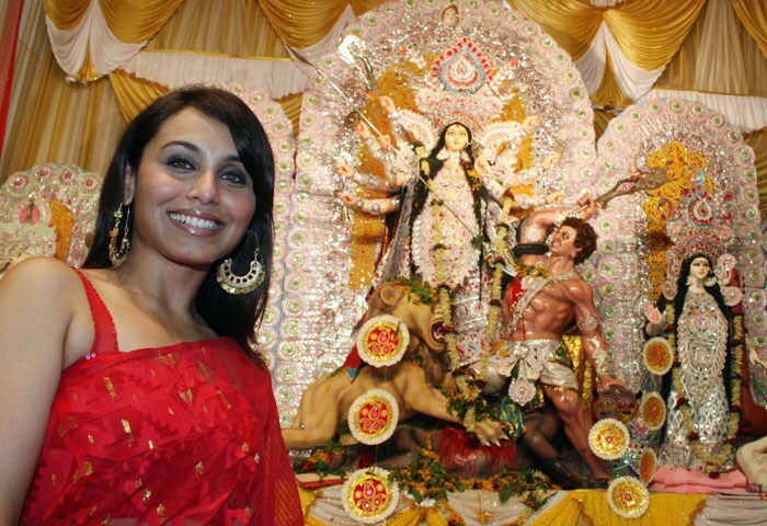 Rani Mukherjee poses in front of a tableaux dedicated to the Hindu Goddess Durga in Mumbai. The five day period of worship of the Hindu Goddess Durga, who is attributed as the destroyer of evil, commenced on September 24 and will end on September 28, with the immersion of idols representing the Goddess in water. (Photo: AFP)