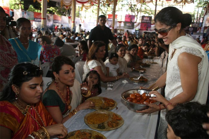 This festive season cousins Kajol and Rani Mukherjee decided to keep their rivalry aside. At the Ashtami puja organised by the North Bombay Sarbojanin Durga Puja Charitable Trust, Juhu, Kajol was seen serving bhog to Rani Mukherjee. (Photo: IANS)