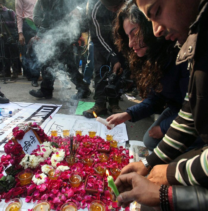 Saying a last goodbye to India's Daughter with flowers and candles.