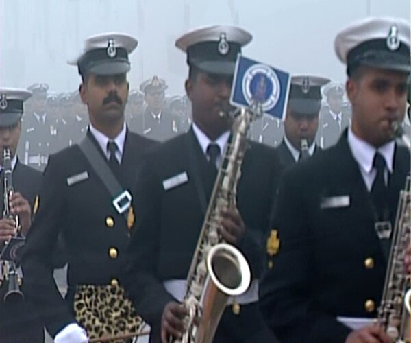 Seen here, the Naval Contingents in their winter ceremonials playing the captivating tone of 'Jai Bhartiya'.(NDTV Photo)