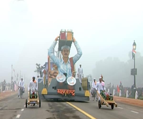 One of the eye-catchers was Maharashtra's float 'Dabbawala', a common sight in Mumbai which showcases the life of Mumbai's signature office tiffin suppliers.<br><br>Dabbawala in CST railway station and an MBA student learning the working skills from the Dabbawala are some of themes in the tableau.(NDTV Photo)