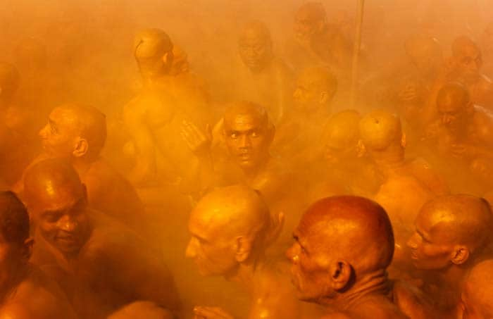 Millions of devout Hindus took holy dips in the frigid waters of the holy Ganges River in a ritual that they believe will wash away their sins.