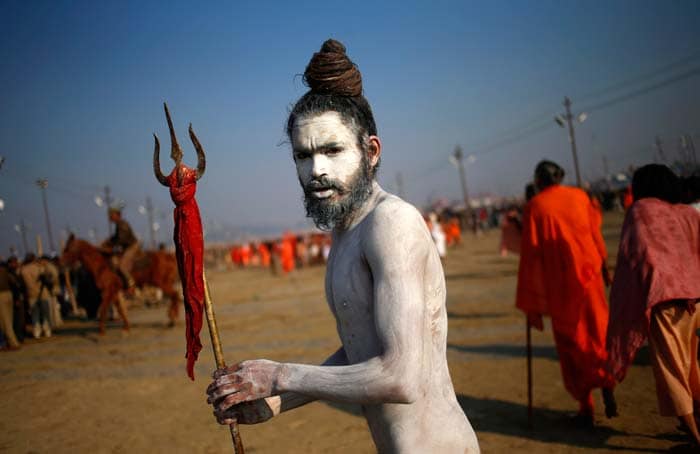 In this February 10 photo, a Naga sadhu returns after taking a dip at the Sangam.