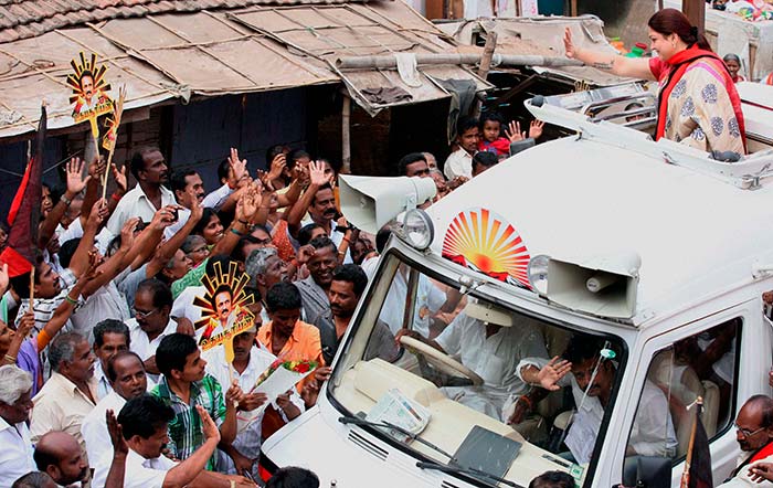 Actress and DMK leader Kushboo travels in a customised van during an election campaign for a party candidate in Coimbatore.