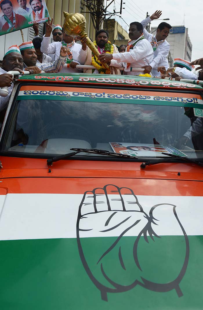 Congress party candidate, M Anjan Kumar Yadav  proceeds to submit his nomination papers for the elections in an SUV decorated in party colours in Hyderabad.