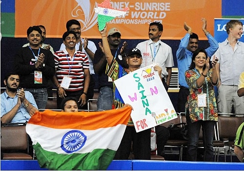 <span class="lh16 fa fs12 fb">Supporters cheer for Saina Nehwal during her women's singles match against Anastasia Prokopenko at The World Badminton Championship at The Gachibowli Stadium in Hyderabad. (AFP Photo)</span>