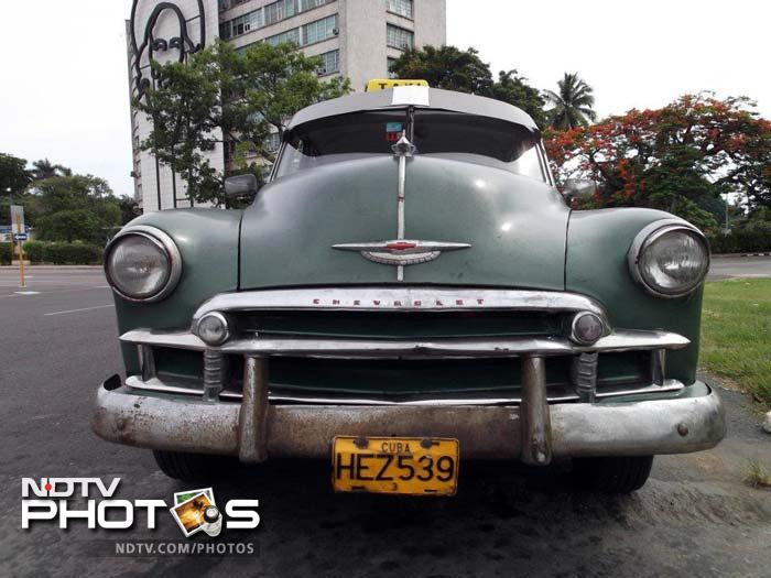 Movies about Cuba like <i>Buena Vista Social Club</i> have glamorised these jalopies. While foreigners swoon over these vintage cars and snap up loads of pictures, Cubans would love to trade in for a new car --but they can't get their hands on any.  (Photo courtesy: Sarah Jacob & Melody Weinstein)