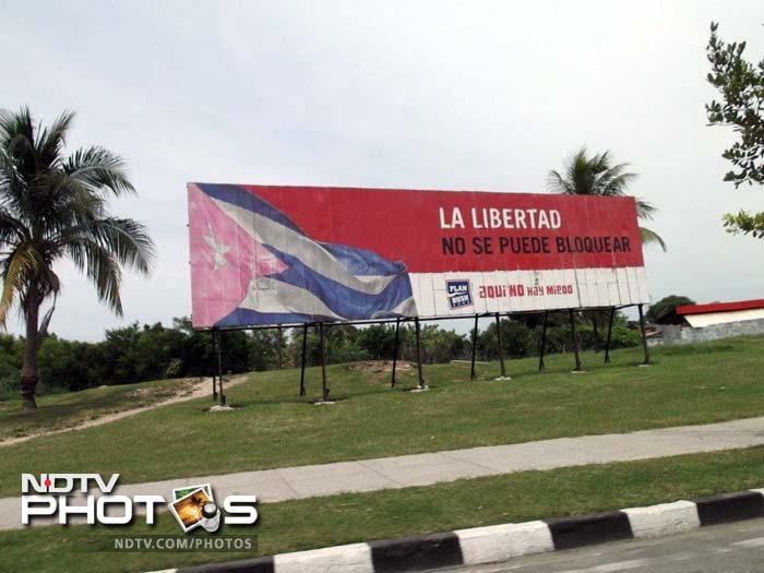 On the streets, all one is greeted with are state billboards. While it may be a refreshing change from the aggressive marketing of consumer goods companies in the US, it does create a problem for the small new breed of entrepreneurs who have embraced President Raul Castro's push for limited free-market reform. (Photo courtesy: Sarah Jacob & Melody Weinstein)