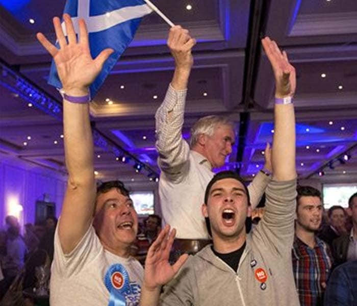 Supporters of the No campaign for the Scottish independence referendum celebrate after the final result was announced at a No campaign event at a hotel in Glasgow, Scotland, Friday, Sept. 19, 2014.