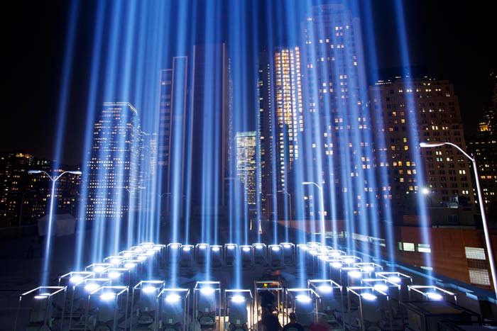 The Tribute in Light, rises above buildings in lower Manhattan, during a test in New York.