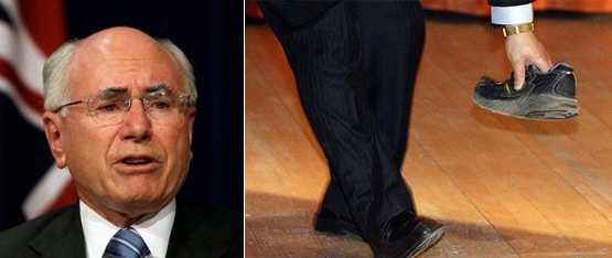 An angry man threw a boot at former Australian prime minister John Howard during a debate at Cambridge University on Thursday. A security guard picked up the shoe that was thrown towards the dignitary. No one ever imagined that "shoe-chucking" would be picked up as an action to get a instant popularity around the world. (AFP image)