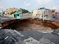 Crews probe Guatemala sinkhole as neighbours flee