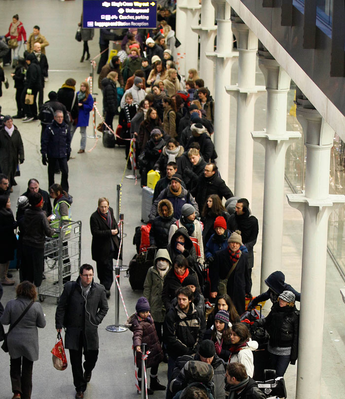 Passengers wait for their flight at Terminal 3 at Heathrow Airport in London, Monday, Dec. 20, 2010. Snow and freezing temperatures continued to cause holiday travel chaos for road, rail and air passengers in Britain and much of Europe Monday, raising fears that many will not get home in time for Christmas. (Photo courtesy:AP)