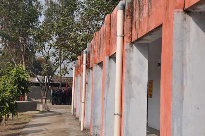 A series of pipes used to transport rain-water as part of the rain water harvesting system at the school.