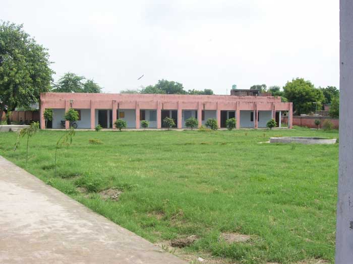 A distant view of the Sonepat school building.