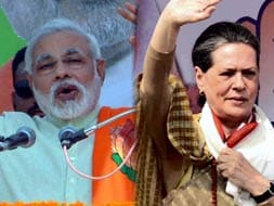 Photo : Assembly elections 2013: Campaign trail heats up as Sonia Gandhi, Narendra Modi exchange jibes