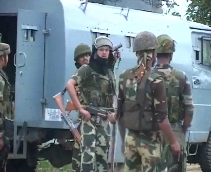 Para military forces cover street in order to control violence. Schools and colleges in the Valley will remain closed for two days to prevent student protests.