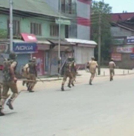 Para military forces wade through the streets to stop the demonstrations.