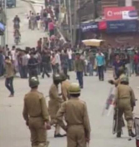 Braving stone pelting, Central Reserve Police Force (CRPF) personnel try to disperse the demonstrators on the street.