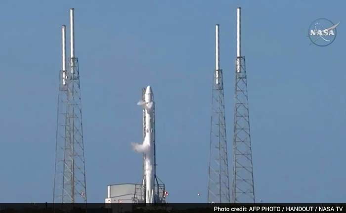 The SpaceX rocket with an unmanned Dragon cargo capsule before the launch in Florida.