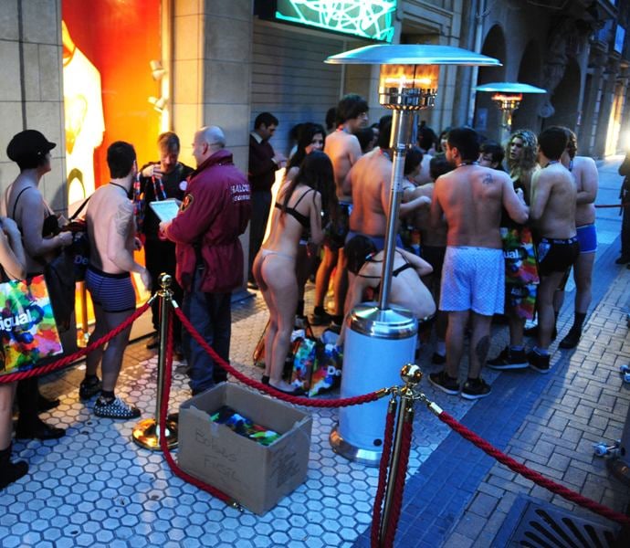 Clothing retailer "Desigual" offered a free outfit to customers coming in bare minimum clothes.(AFP Photo)