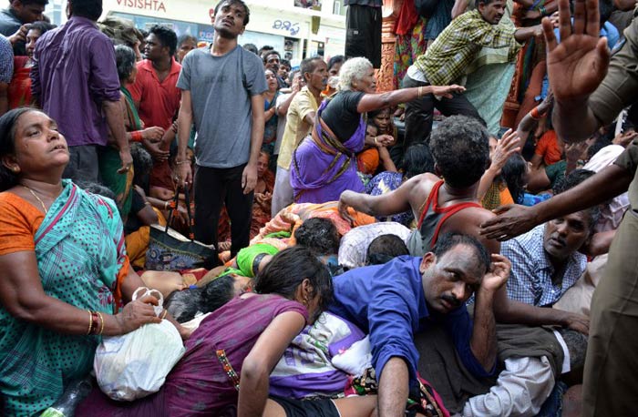 25 others were injured in the stampede. They were taken to the Rajahmundry government hospital where the condition of some of them was stated to be critical. (AFP photo)