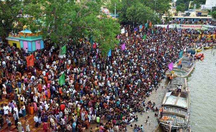 A sea of pilgrims at the ghat rushed towards the three gates and tried to scale them, leading to the stampede, said officials. The pilgrims coming out after a dip and those trying to reach the ghat were caught in the rush at the gates. (AFP photo)