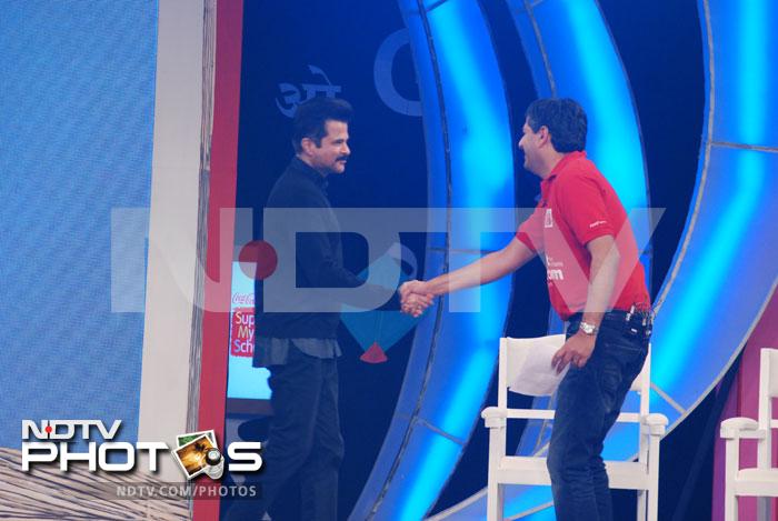 Anil Kapoor is greeted by NDTV's Vikram Chandra.