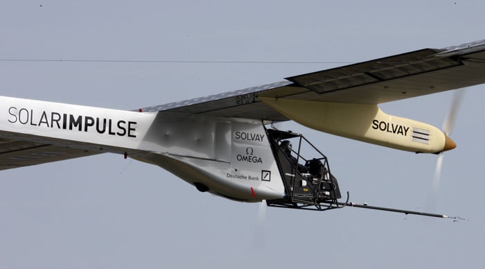 The Solar Impulse lifted off from a military airport at a speed no faster than 28 mph (45 kph) after briefly accelerating down the runway.<br><br>It slowly gained altitude above the green-and-beige fields and eventually faded into the horizon as villagers watched from the nearest hills. (AFP Image)